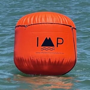 A buoy floating on top of the ocean.