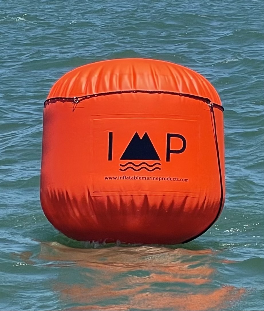 A buoy floating on top of the ocean.